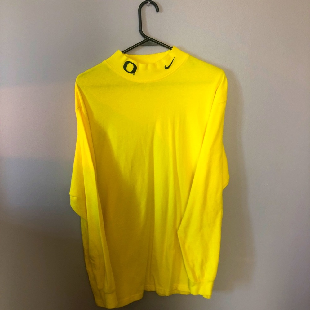 Nike Women’s Small Oregon turtle neck sweater.